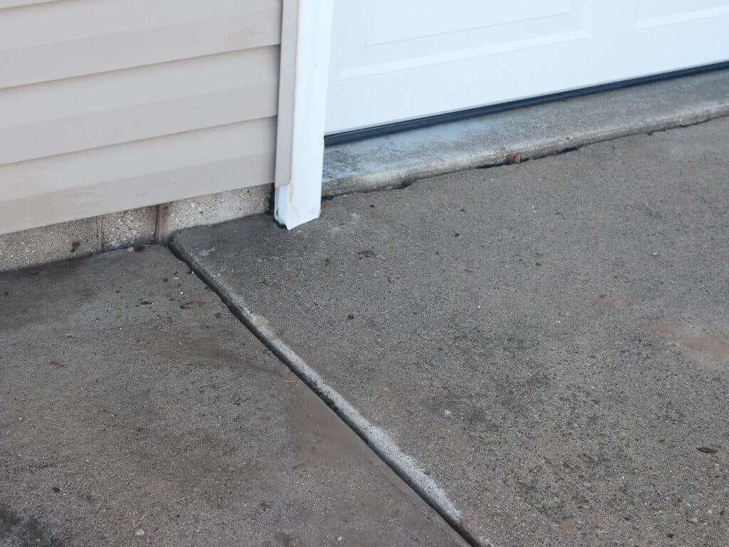 Concrete raising and levelling: garage slab joint