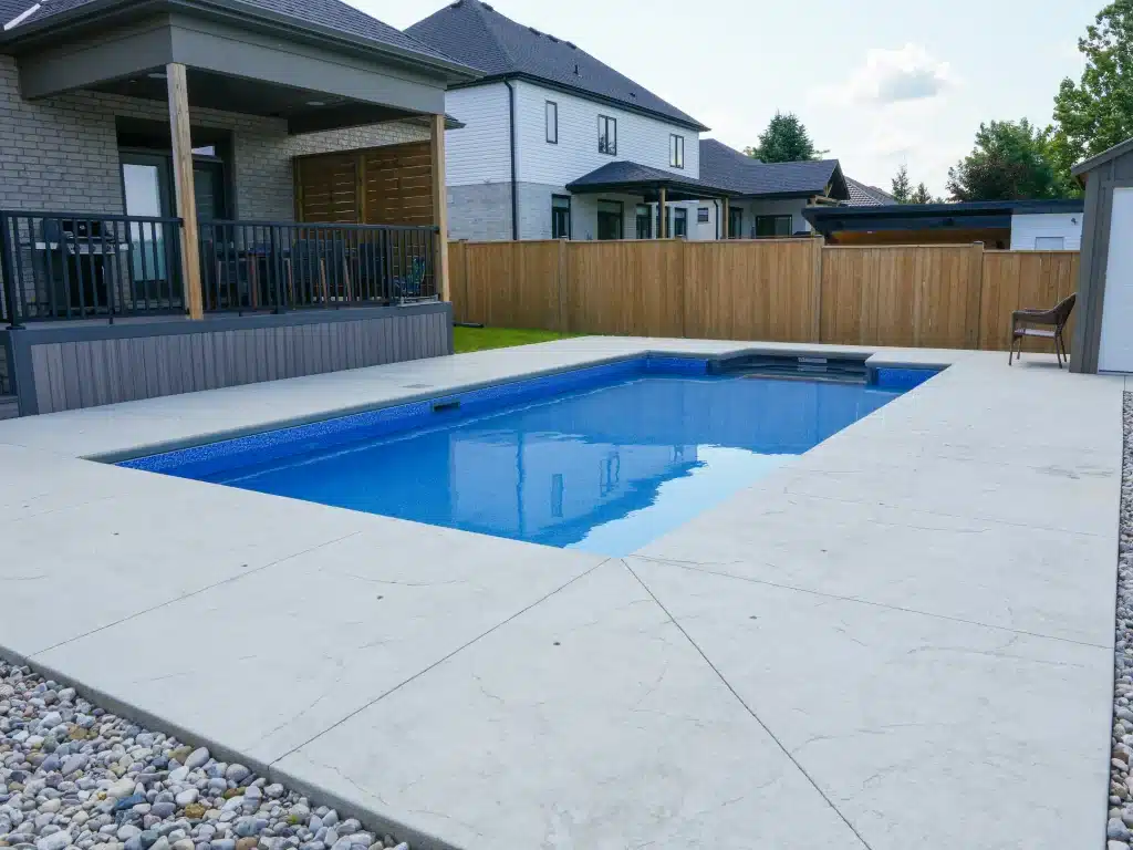Finished concrete pool deck by Brosco Concrete