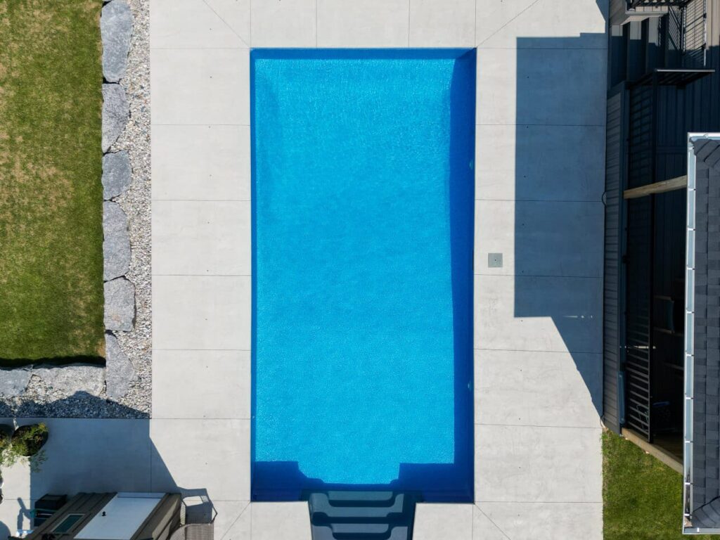 Finished concrete pool deck by Brosco Concrete
