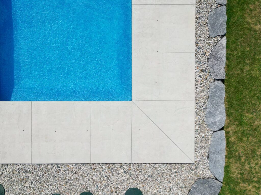 Finished concrete pool deck by Brosco Concrete
