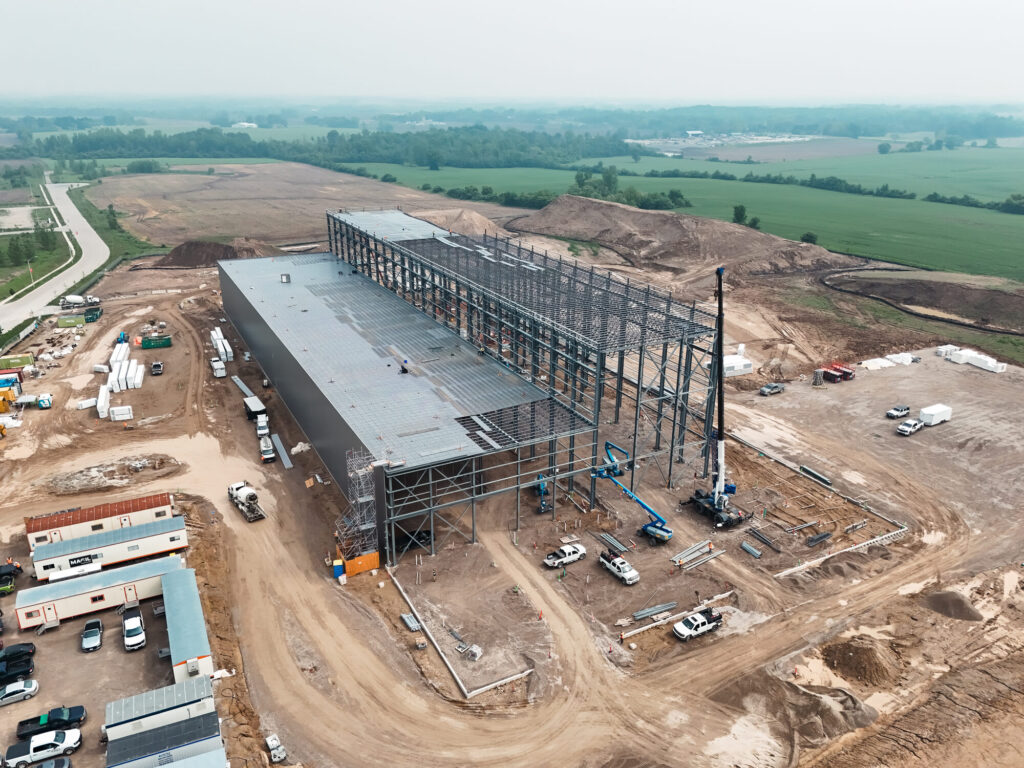 Aerial view of a large-scale commercial building during construction