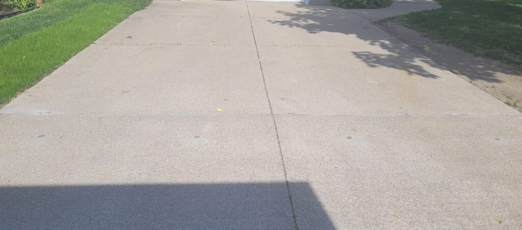 The same concrete walkway raised back to grade