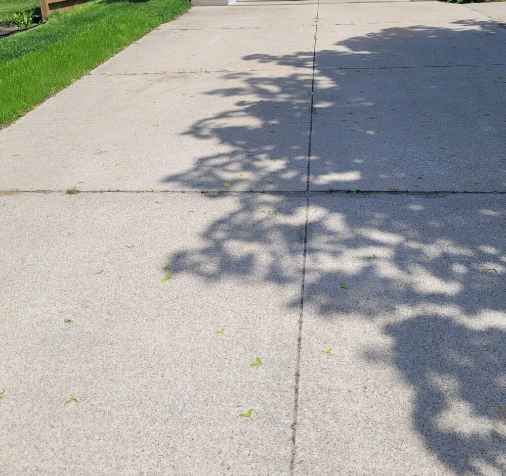 Settled concrete walkway before polyurethane raising and levelling
